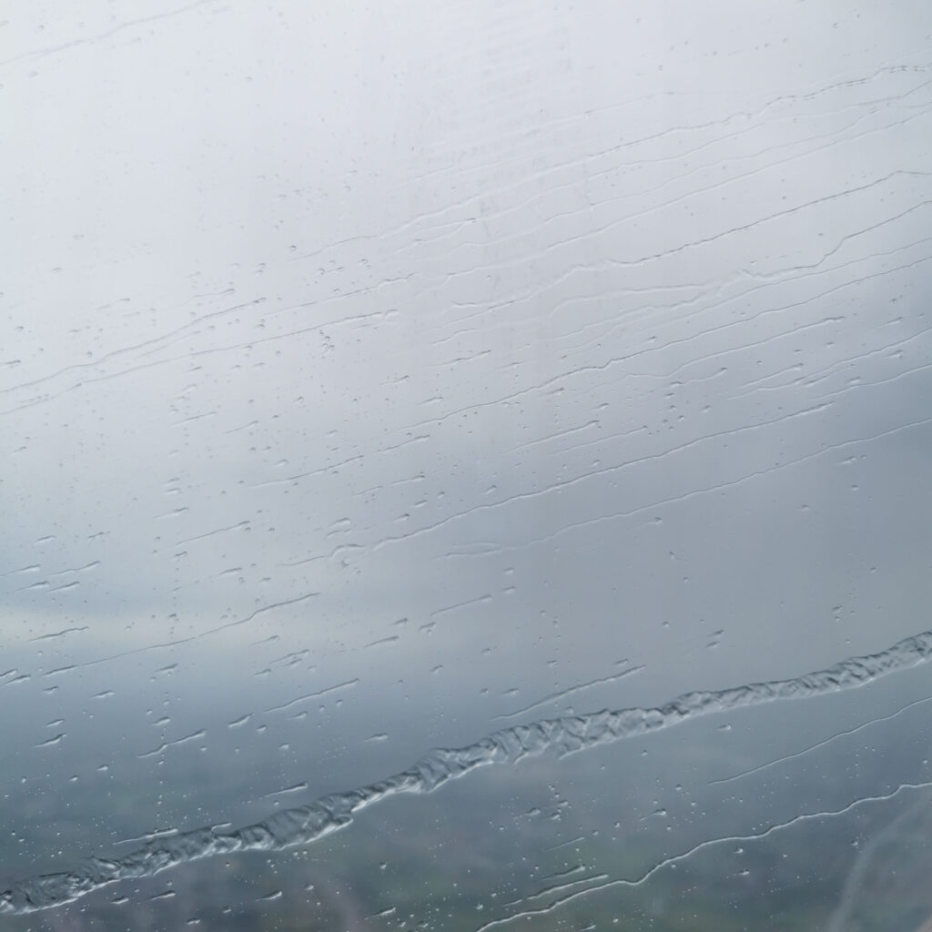 vitre avion goutte