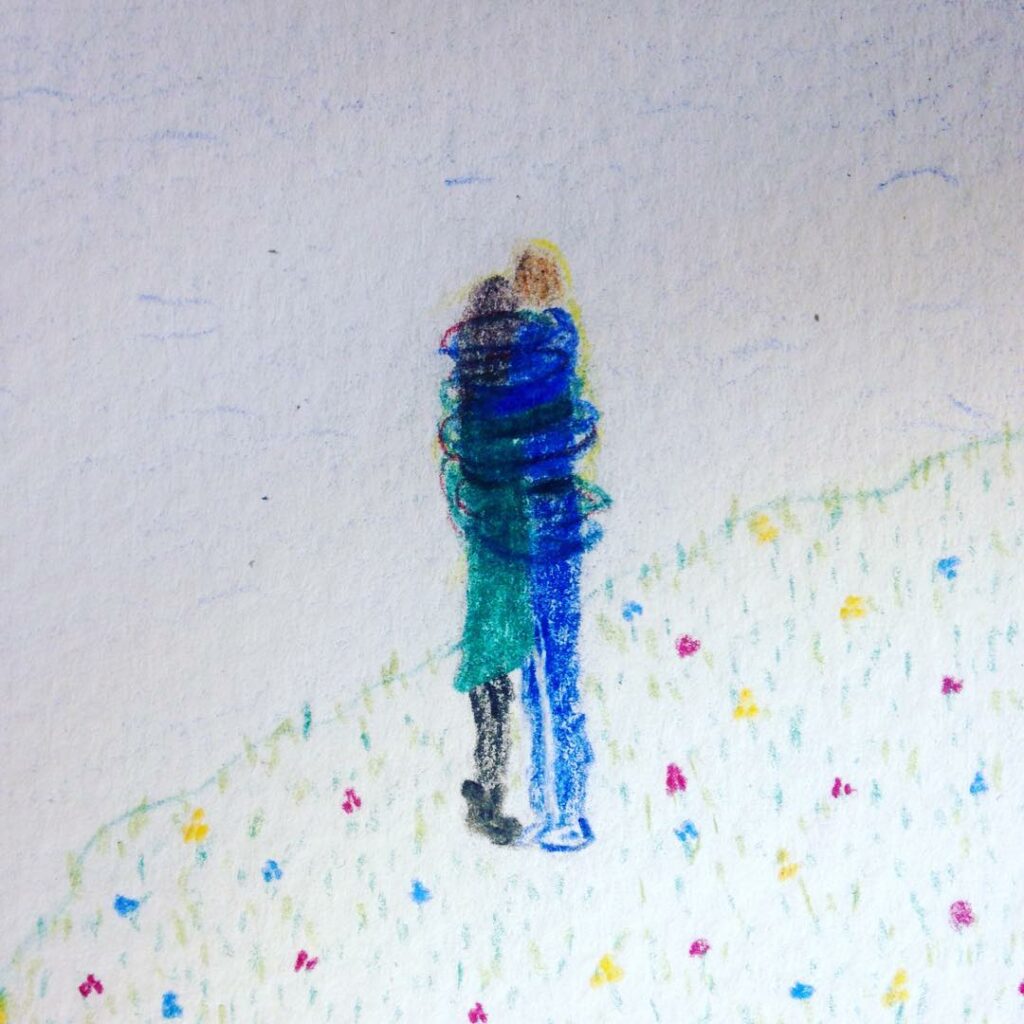 Dessin d'un couple enlacé aux crayons de couleurs